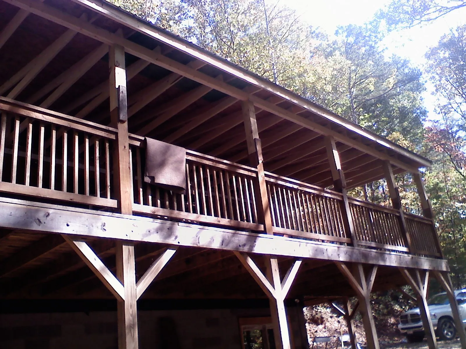 Timber framing under a new elevated porch and deck — Roof Leak Repair in Glide by Roofing Brothers